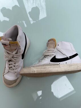 Nike White High-Top Sneakers with Black Swoosh and Tan Accents